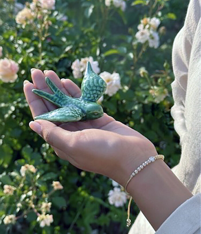 conjunto de andorinha em cerâmica e pulseira 4